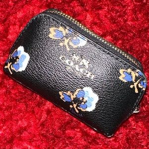 Coach coin purse. Multicolored floral. Great condition.